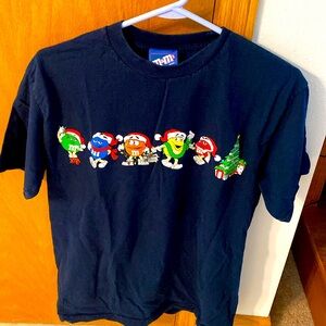 Christmas M&M shirt with little m&m people dressed for holiday